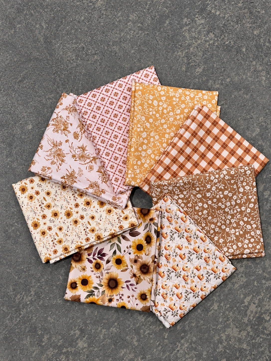 Riley Blake Designs Harvest on the Prairie 8-piece fat quarter bundle with autumn-inspired fabric prints.