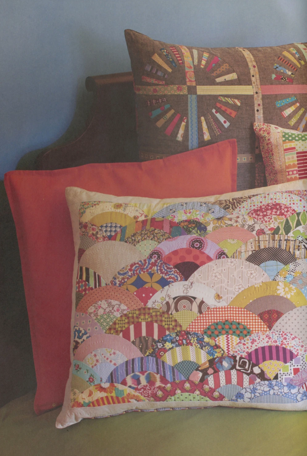 Colorful quilt book by Jen Kingwell featuring 15 vibrant quilt projects, shown with a decorative pillow in a detailed fabric design.