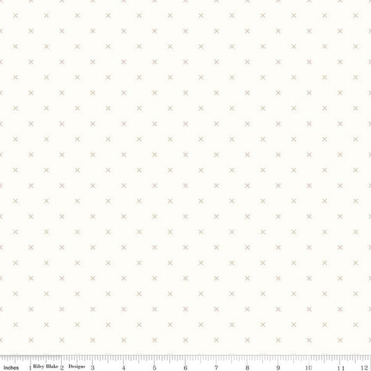 Brown quilting cotton fabric with bee and cross-stitch pattern from Riley Blake Designs, perfect for quilting and sewing projects.